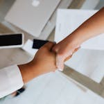 Two People Doing A Handshake